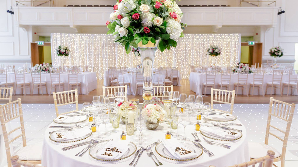 Coconut Gelato tablecloth and napkins with Gold Beaded chargers