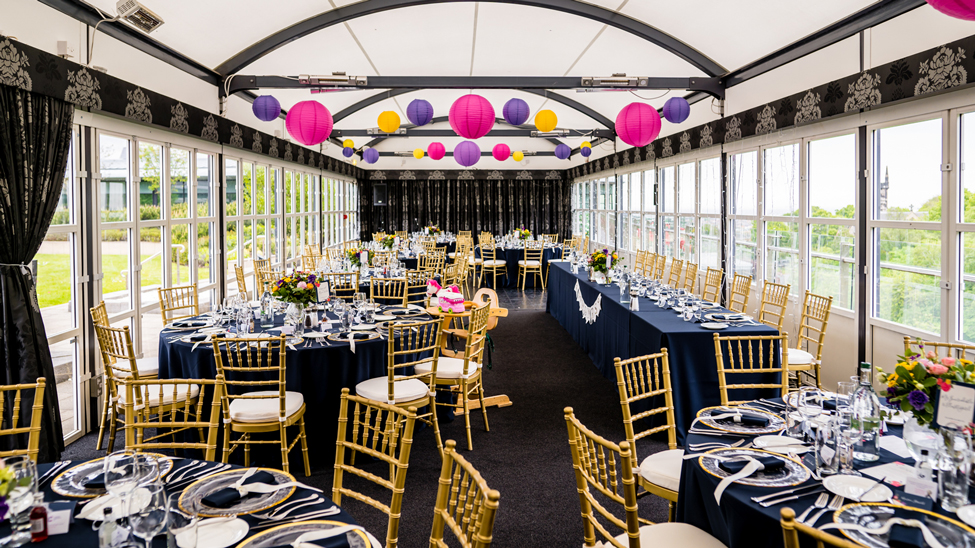 Navy Essential tablecloths and Navy Essential napkins with Gold Trim chargers