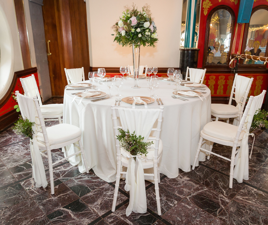 Cream Essential tablecloth with Rose Gold Starburst chargers and Ivory Chiavari chairs Cream Essential tablecloth with Rose Gold Starburst chargers and Ivory Chiavari chairs