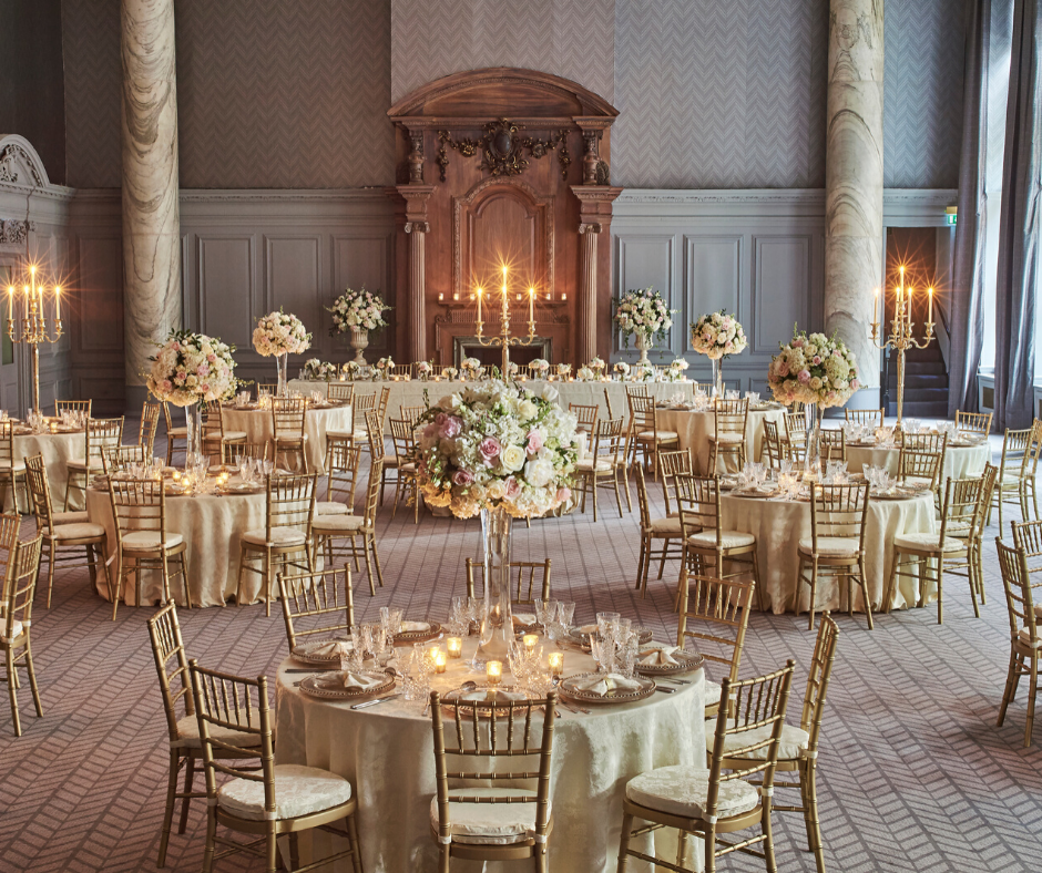 Cornish Cream Vintage Damask tablecloth with Gold Chiavari chairs and matching Cream Damask cushioned seat pad