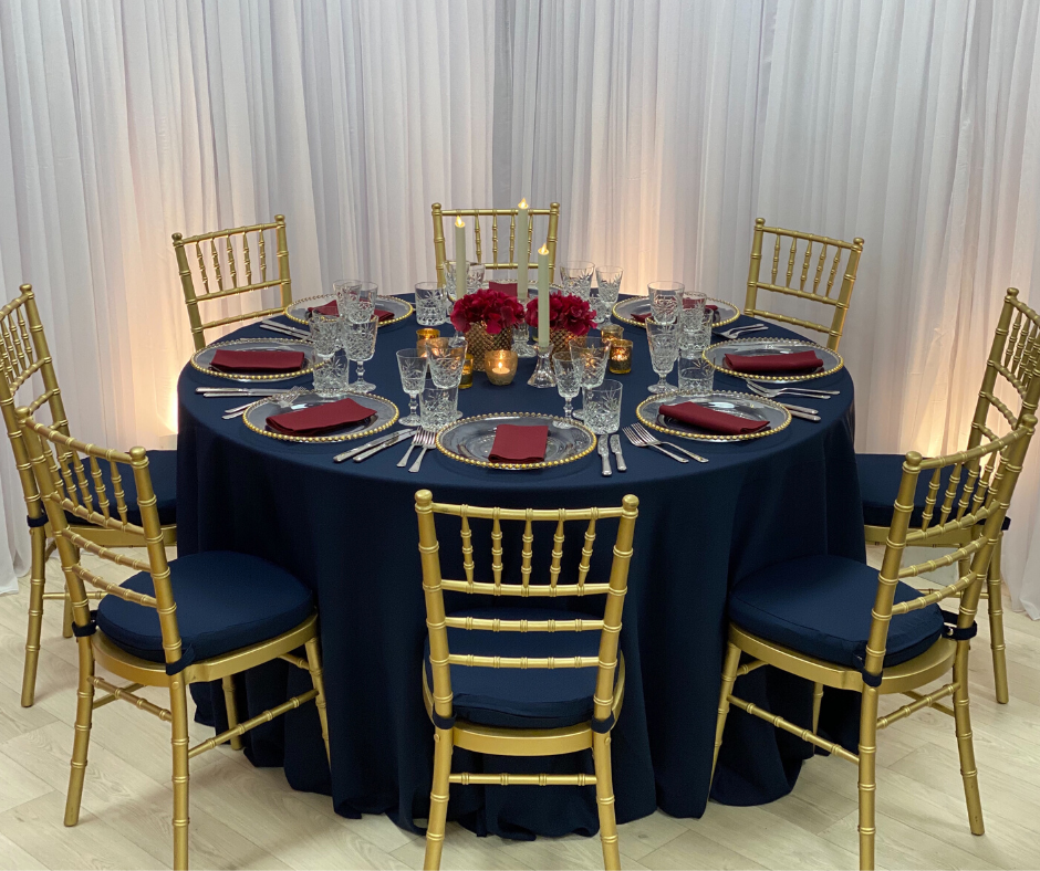 Navy Essential tablecloth with Gold Chiavaris w/matching Navy Essential cushioned pads Navy Essential tablecloth with Gold Chiavaris w/matching Navy Essential cushioned pads
