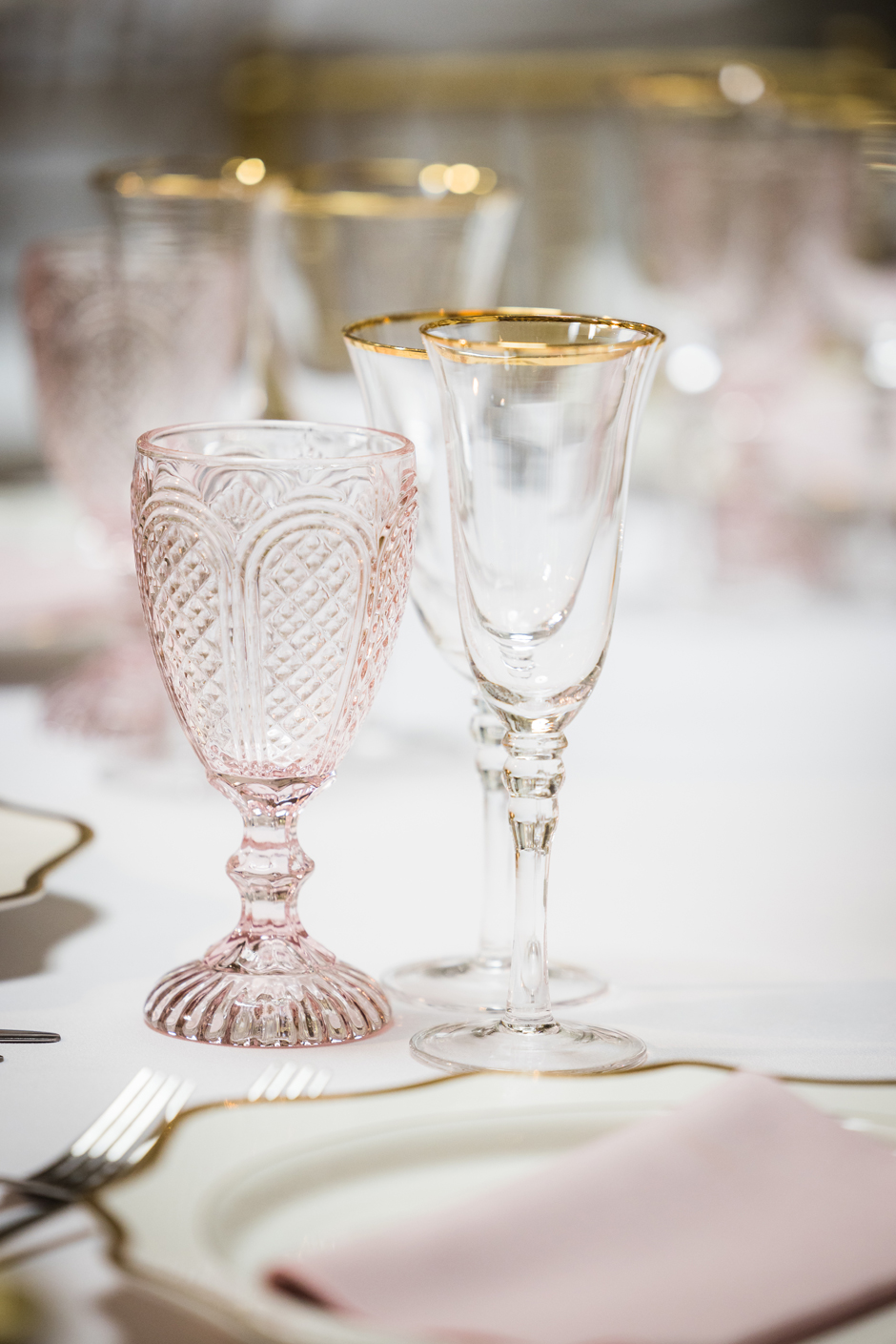 Pink goblet with white Essential linen, peony Gelato napkin, gold trim Porcelain charger plate & gold trim glasses